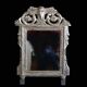 Small mirror, silver-leafed wood