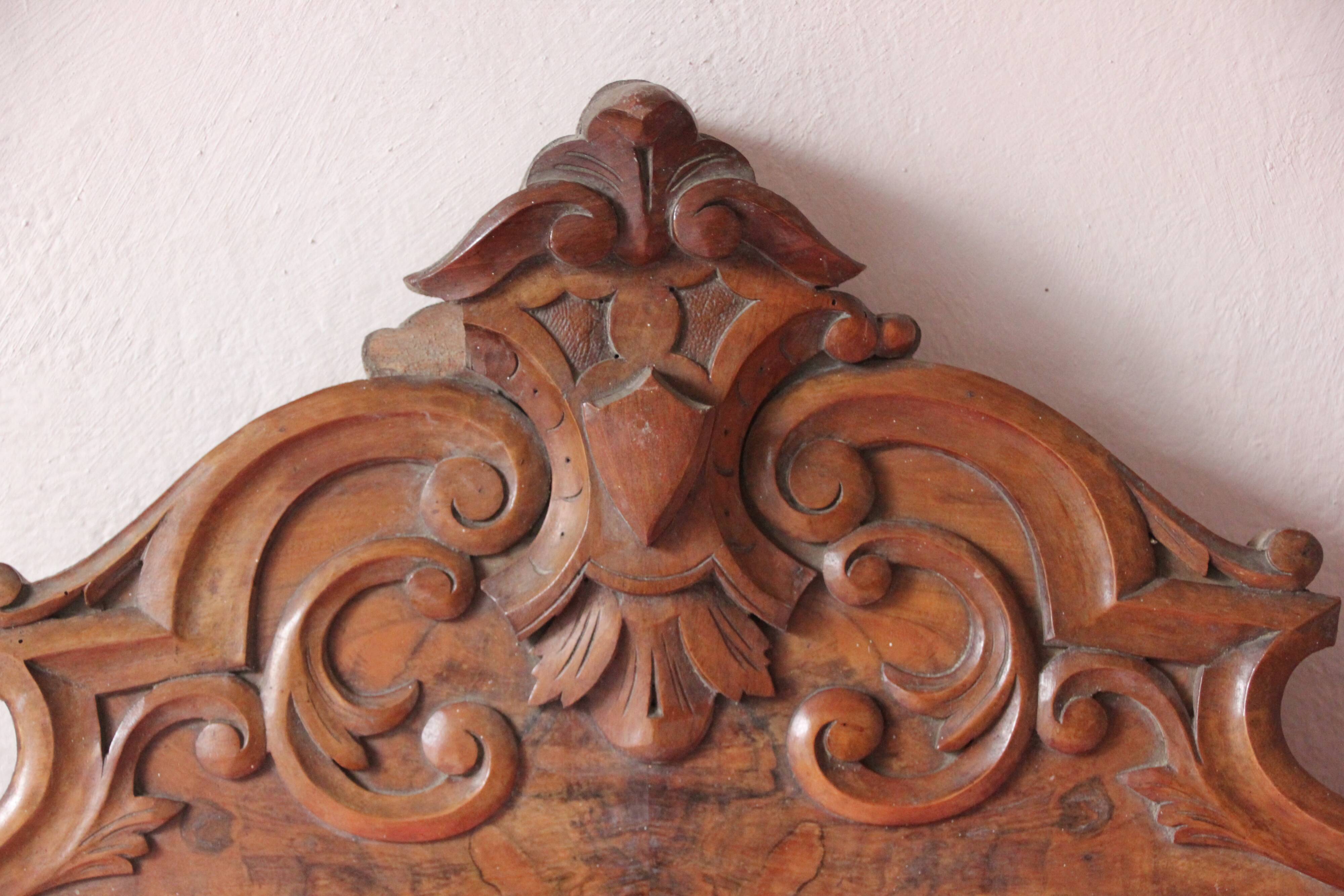 Old pediment in solid and marquetry wood