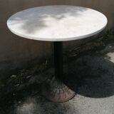 Round bistro table in stone and cast iron