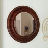 Antique round wooden mirror