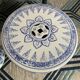 Set of two white and blue porcelain side tables.