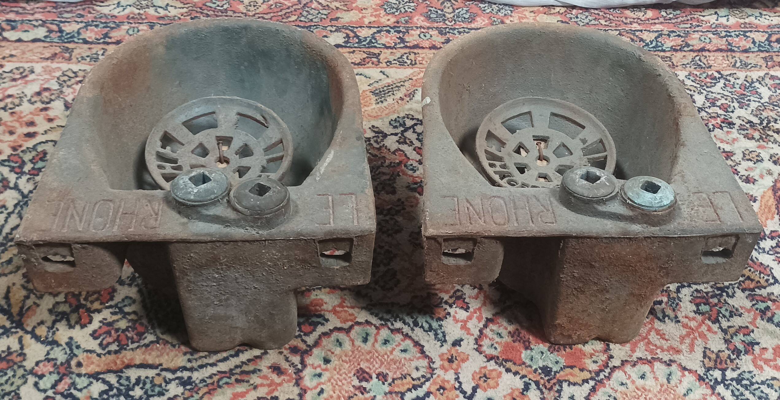 Pair of old cast iron Le Rhône drinking troughs