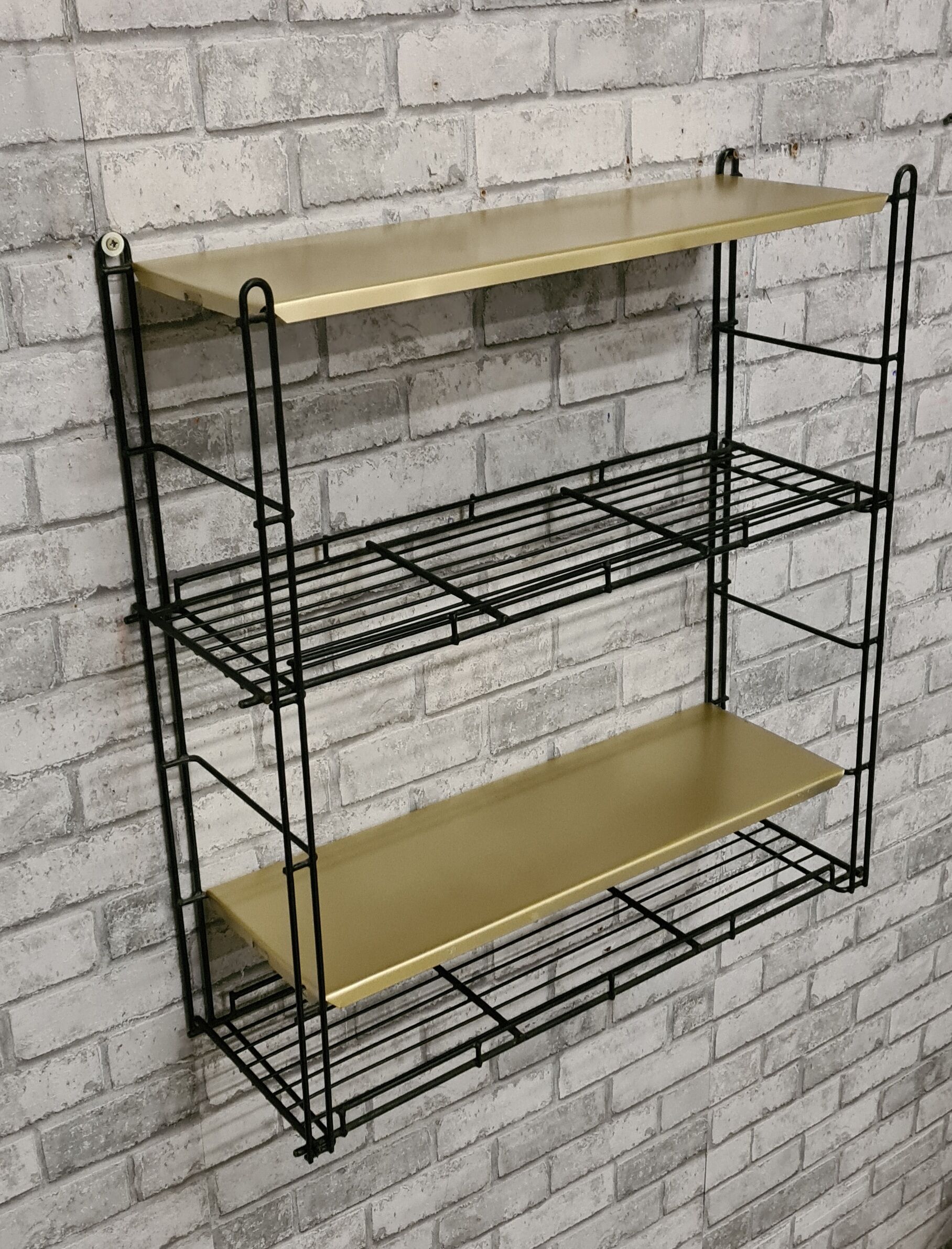 Bronze and black metal shelf 1970