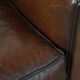 Armchair made of sheepskin leather in art deco design with warm colours