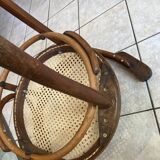 Bistro chair with a curved wooden frame and caned seat from the 1930s.