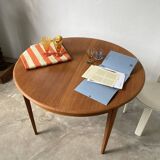 Scandinavian round teak table with extension