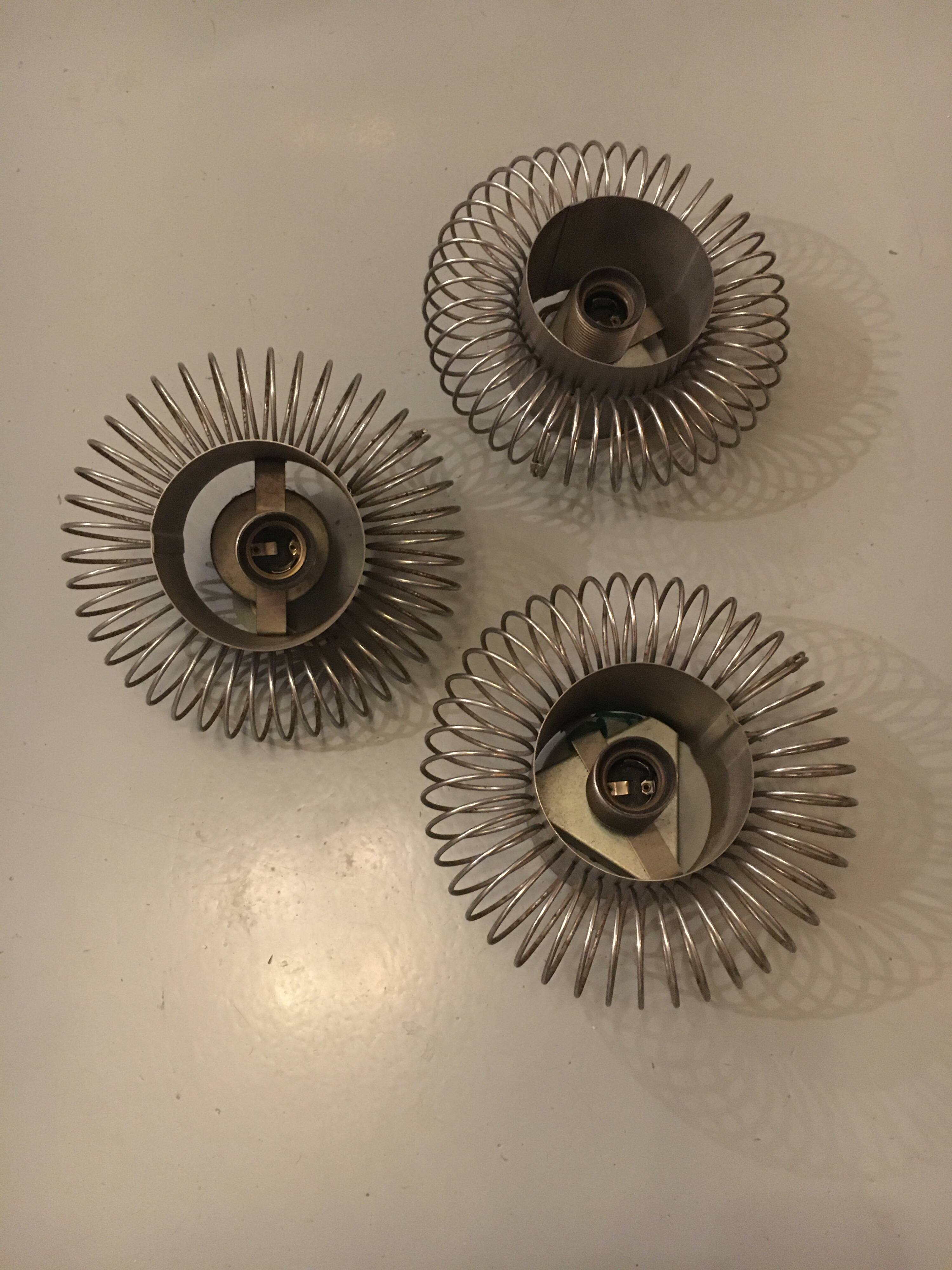 Set of 3 “spring” design wall lights in chrome metal, 1970s, in the spirit of Andrea Lazzari