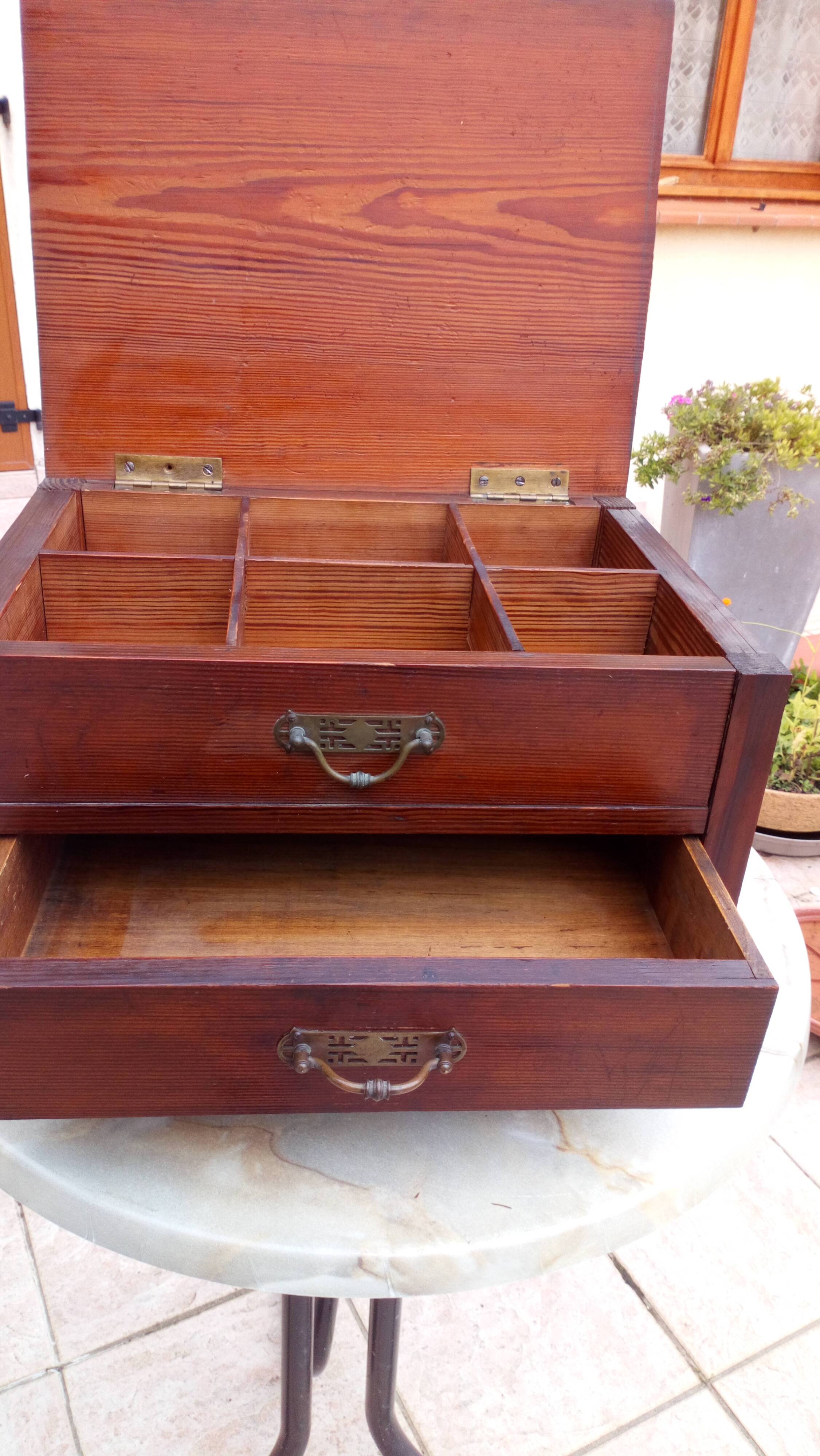 Small low cabinet for sewing from the 1930s.