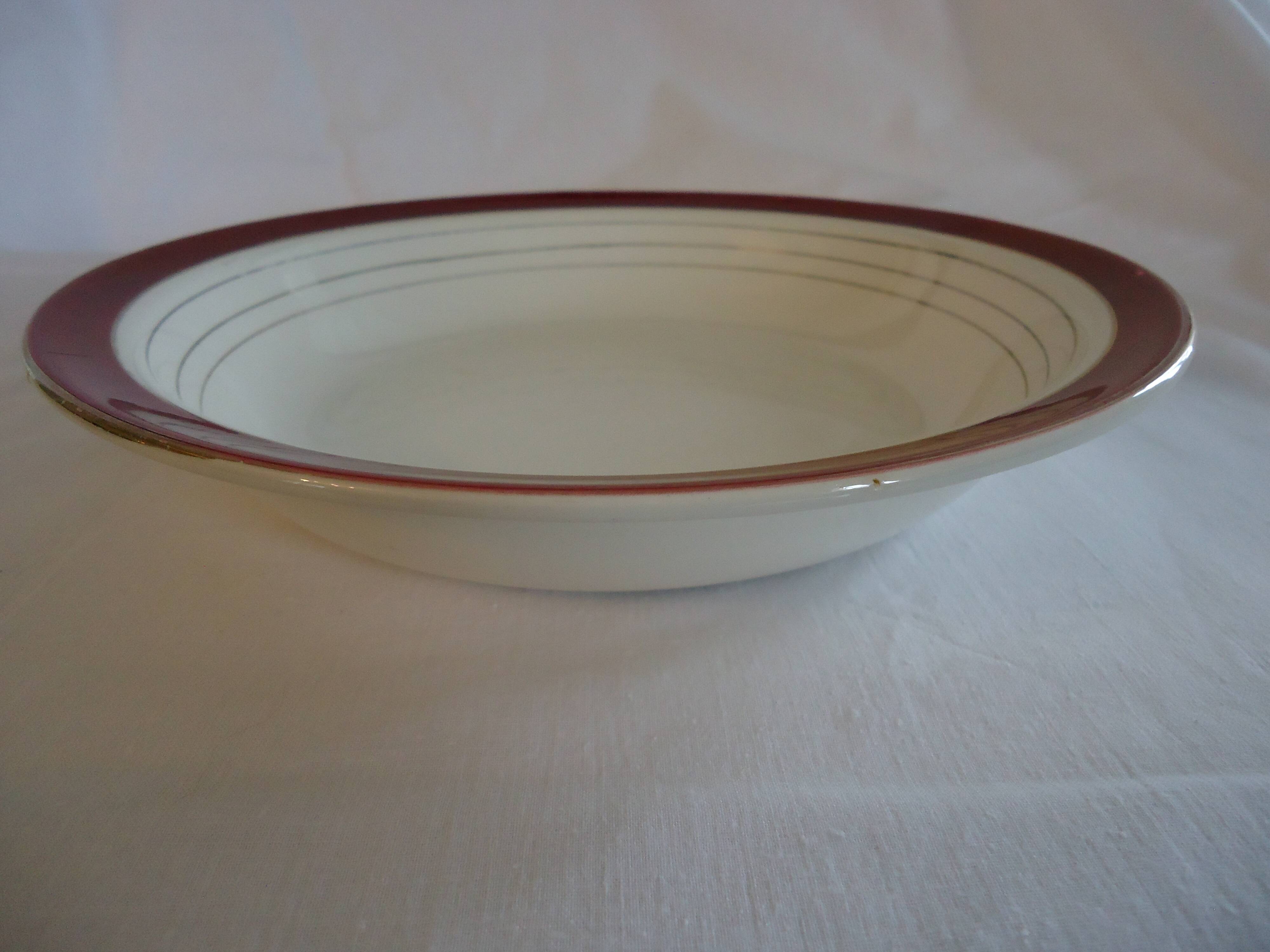 Round, hollow, opaque porcelain serving dish by digoin sarreguemines pasteur