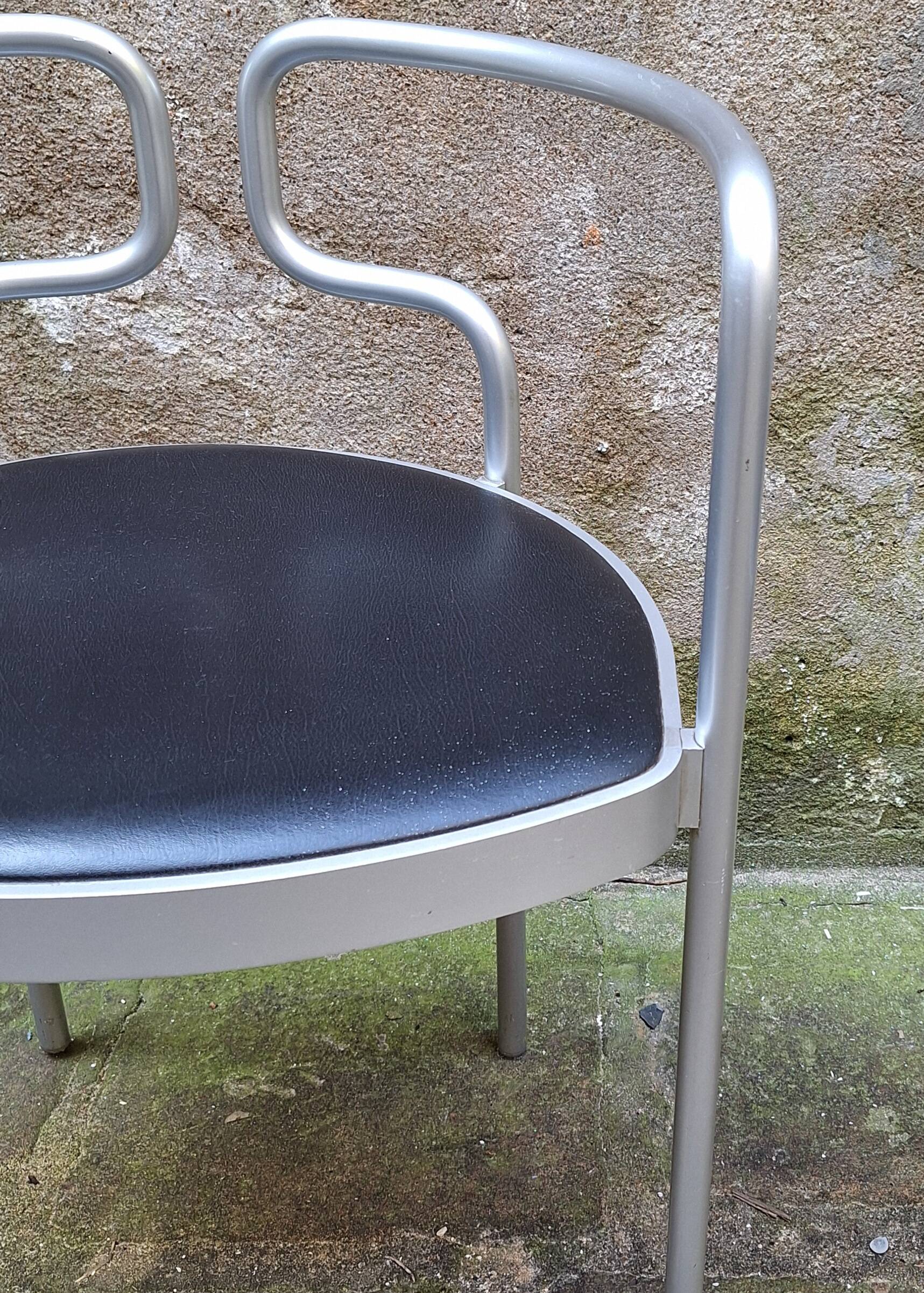 Pair of aluminum armchairs by Henning Larsen