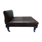 Old adjustable chair in wood and leather