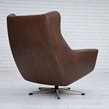 Années 1970, chaise pivotante danoise avec repose-pieds, bon état d'origine, cuir.