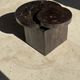Brown petrified wood coffee table from Indonesia with a double circular top.