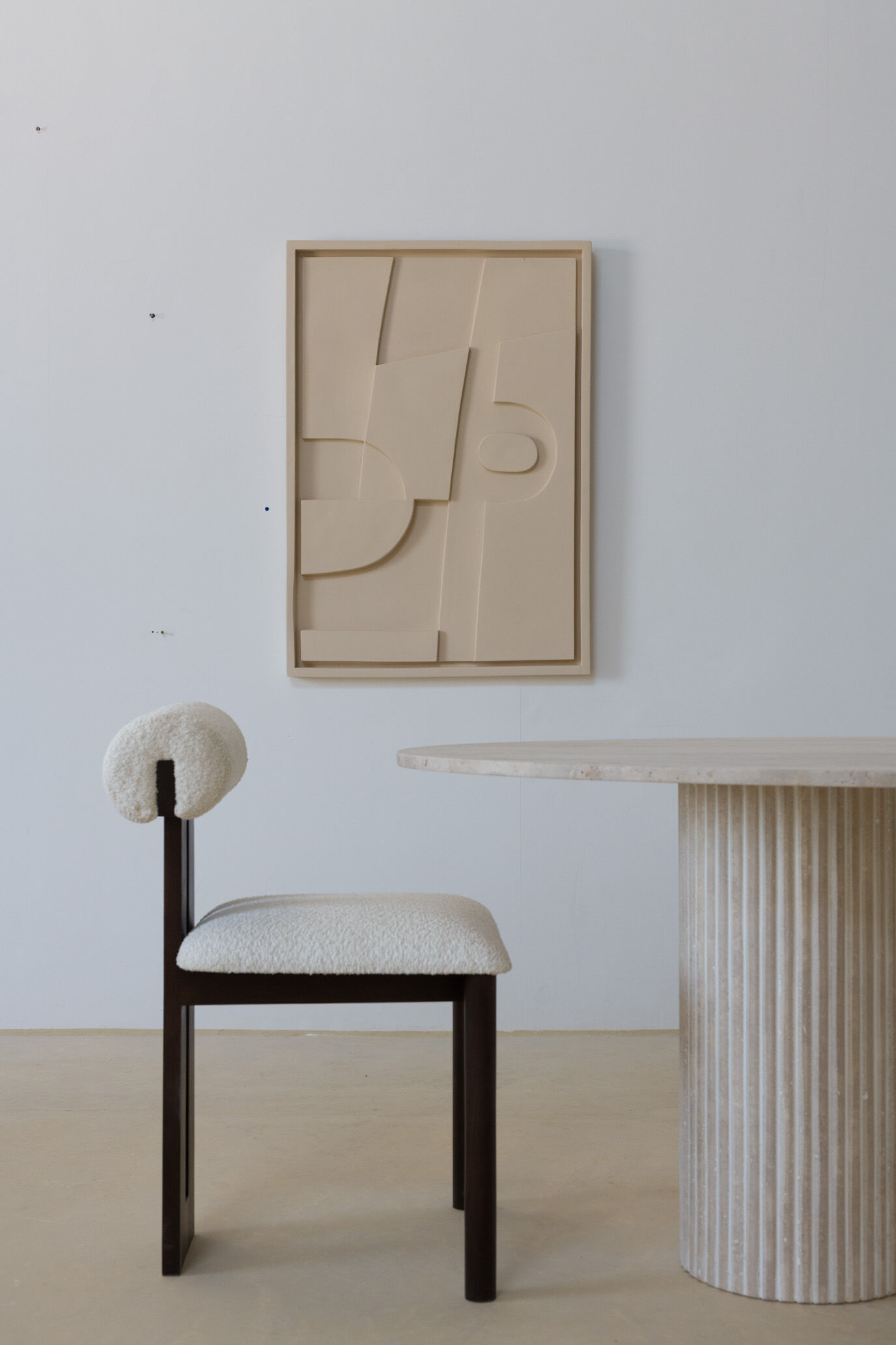 Natural travertine oval dining table - striated foot