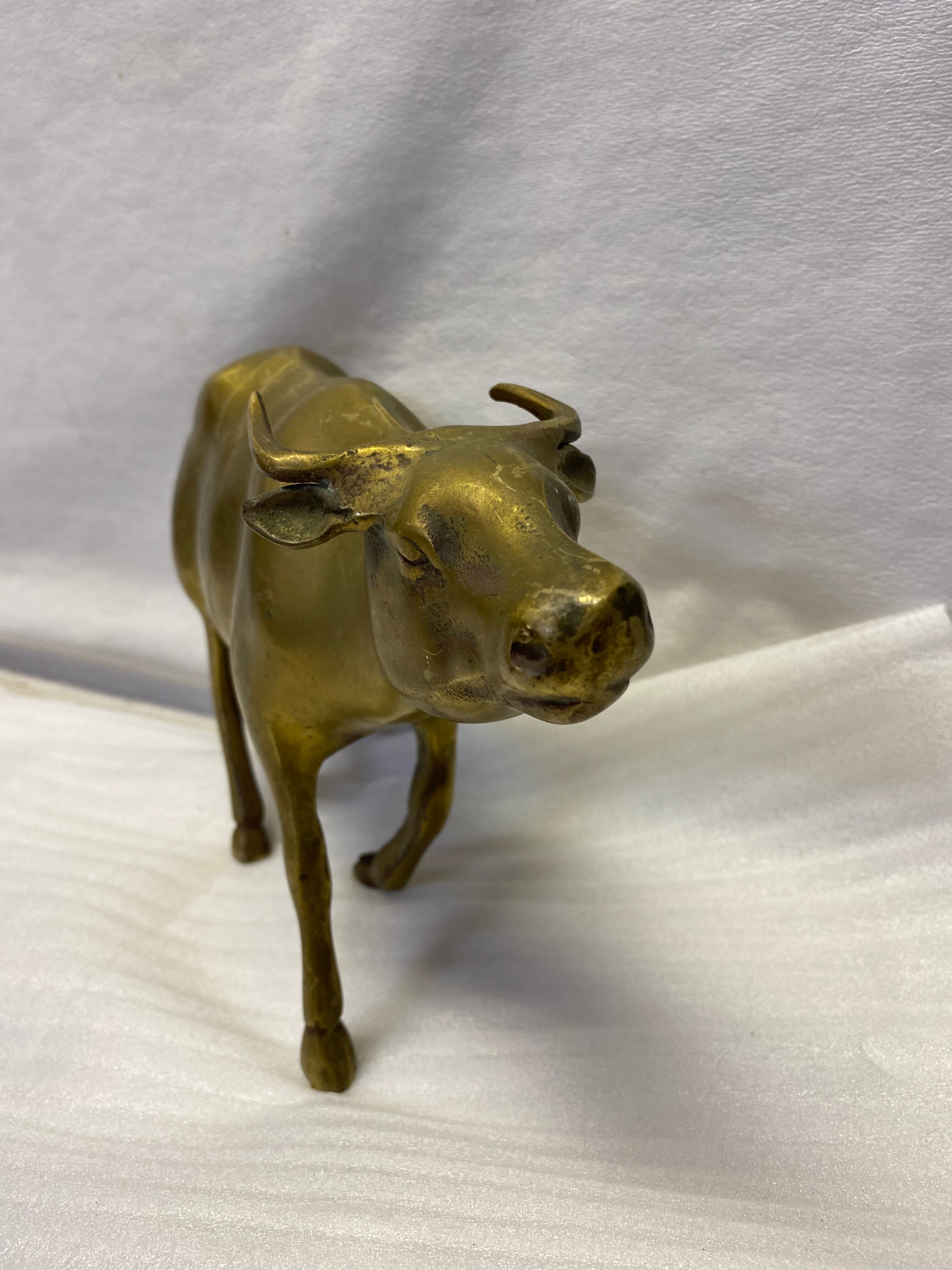 Brass buffalo figure