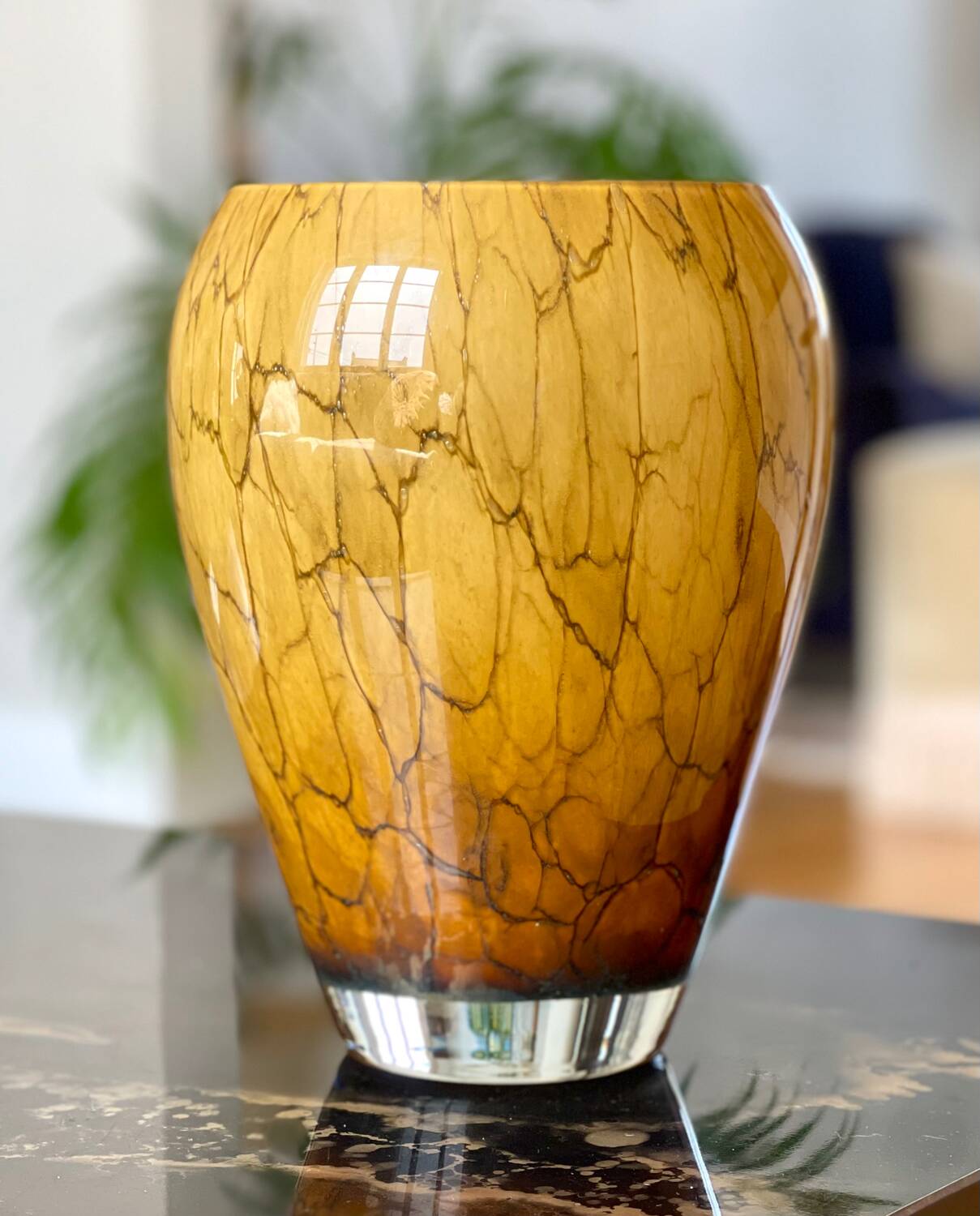 Mouth-blown glass vase.