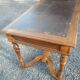 Old flat desk with brown leather top