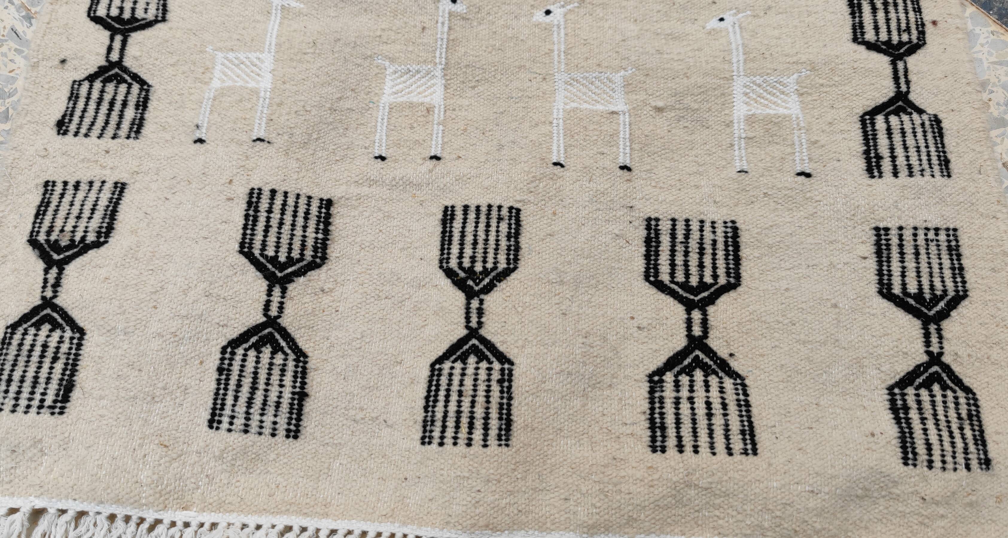Handwoven kilim rug in natural wool