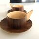 Vintage wooden cups and saucers in teak