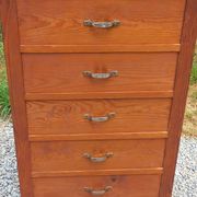 Vintage 1950s chest of drawers with tapered legs and 5 drawers.