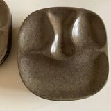 Set of 8 mid century modern stoneware potter's plates to identify