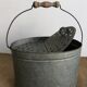Old zinc stud, fisherman's live bucket