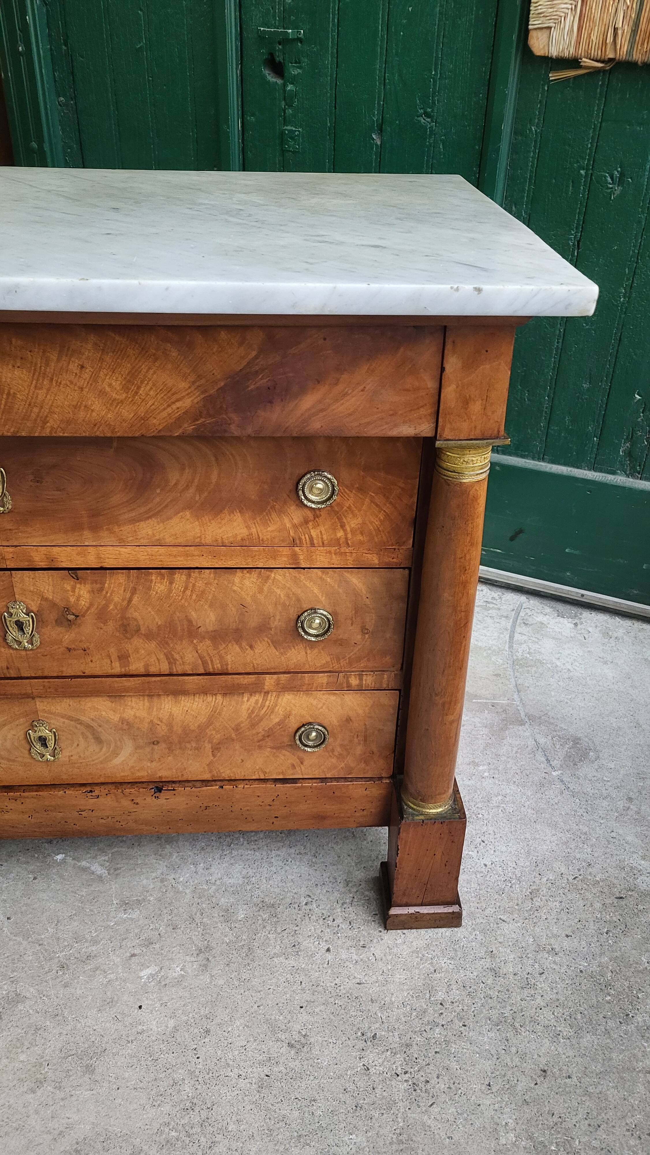 Empire commode in walnut with white marble top from the 19th century