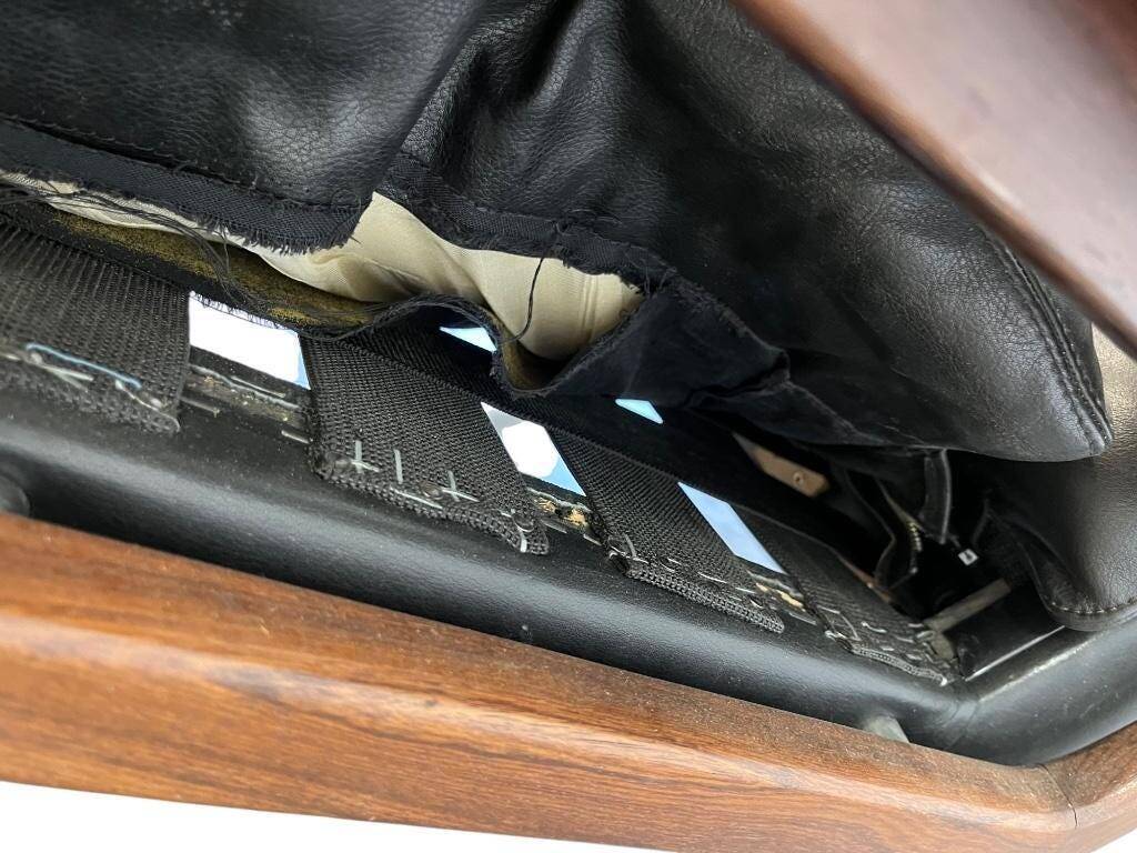 Vintage black leather armchair / Andre Vandenbeuck single seater armchair