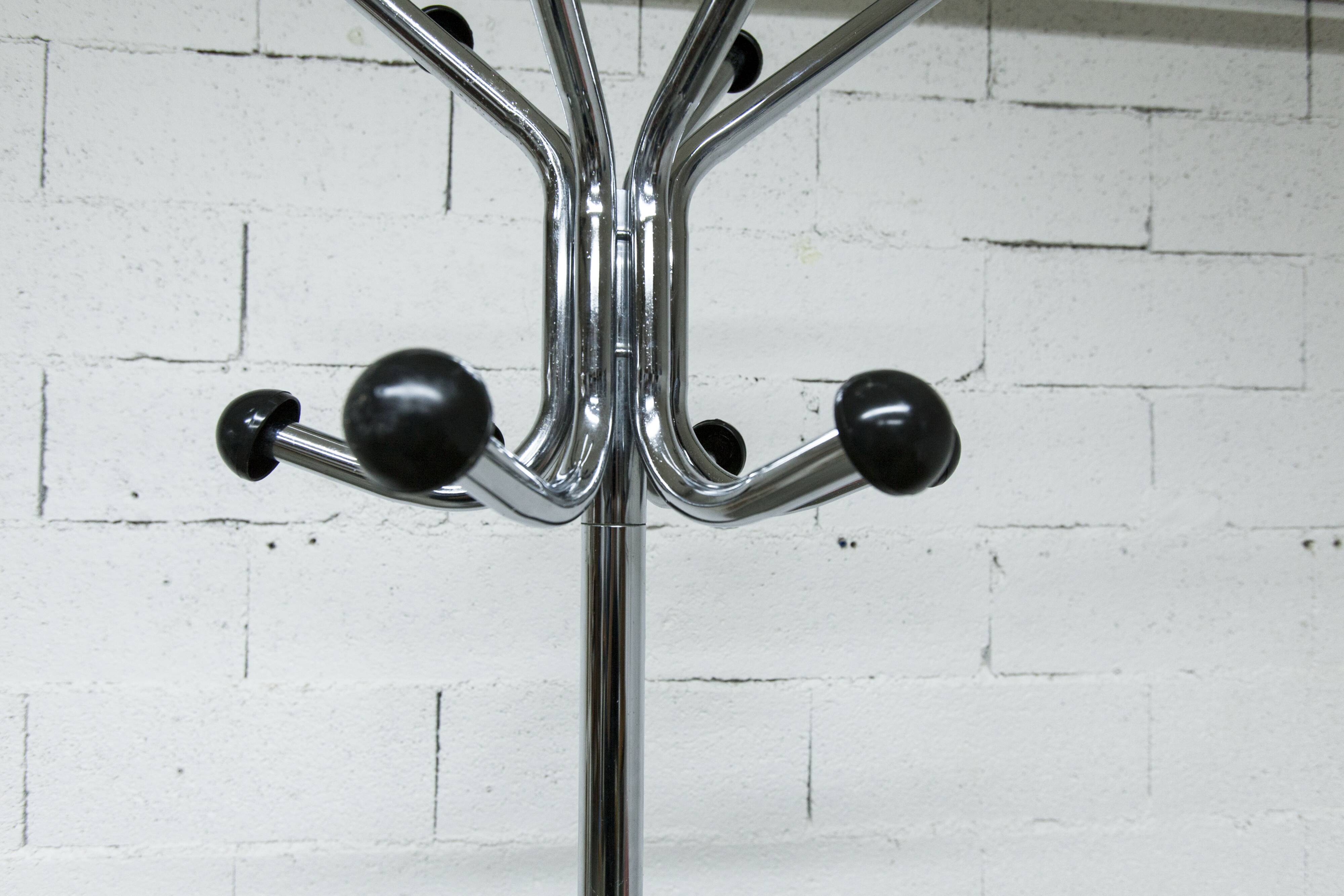 Coat rack with 12 chrome and black plastic hooks, 1960, 2m.
