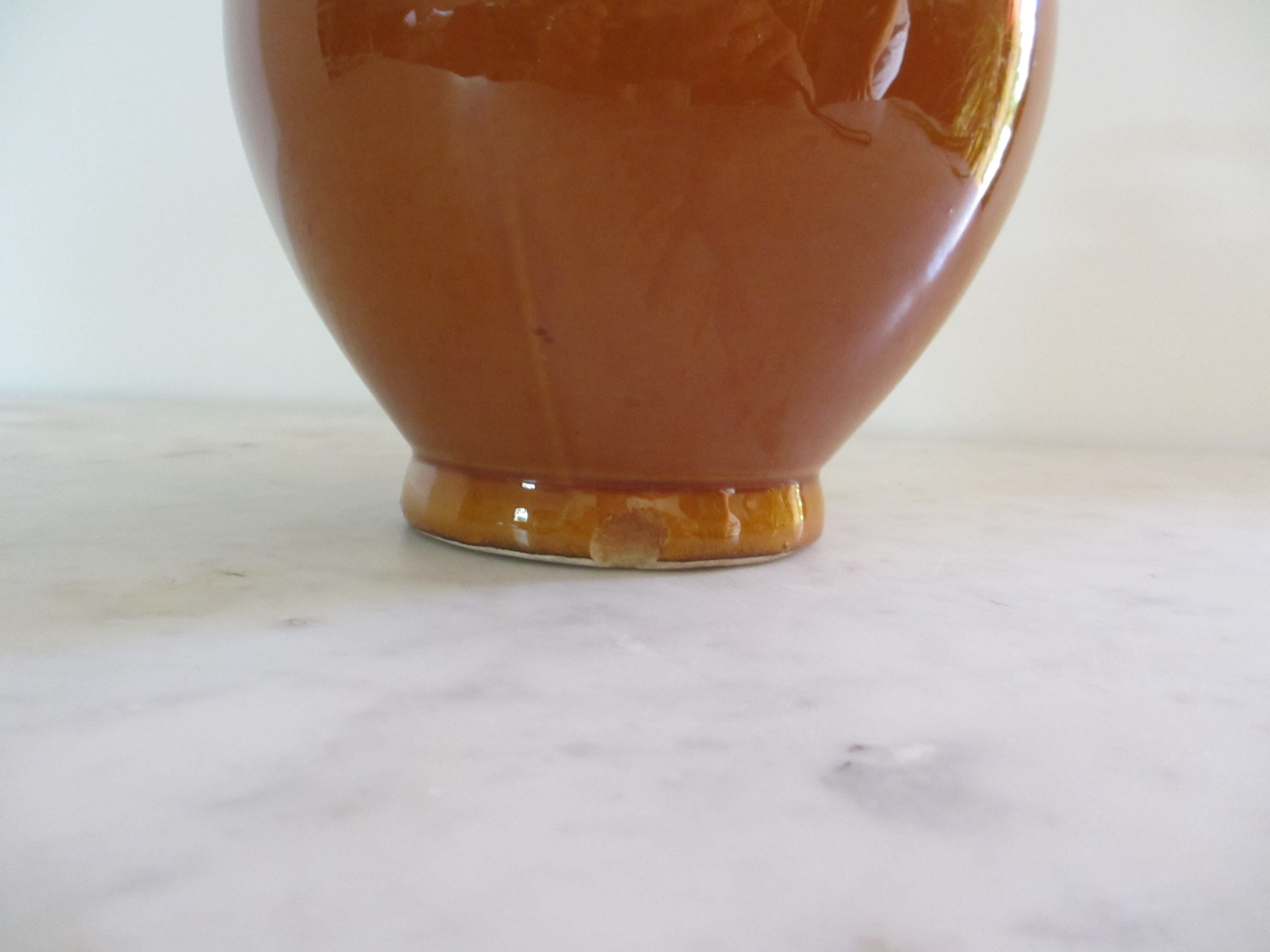 Jug in enamelled faience