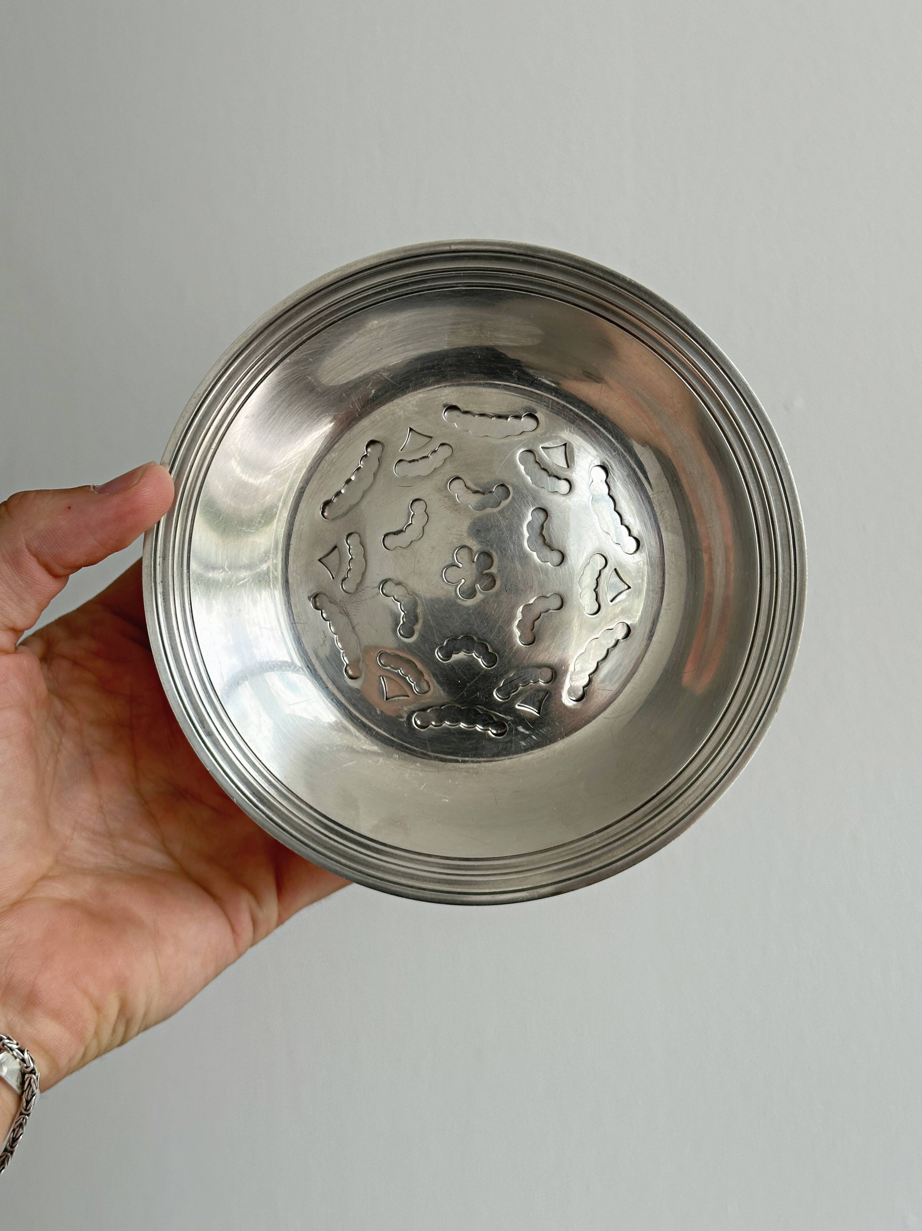 Antique shiny metal butter dish