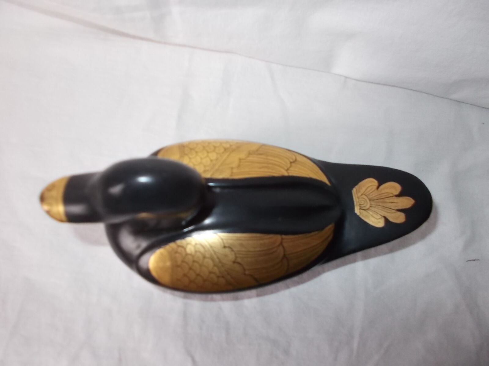 Duck box in black and golden lacquered wood