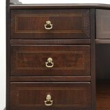 A desk with an English-style chair. After professional renovation.