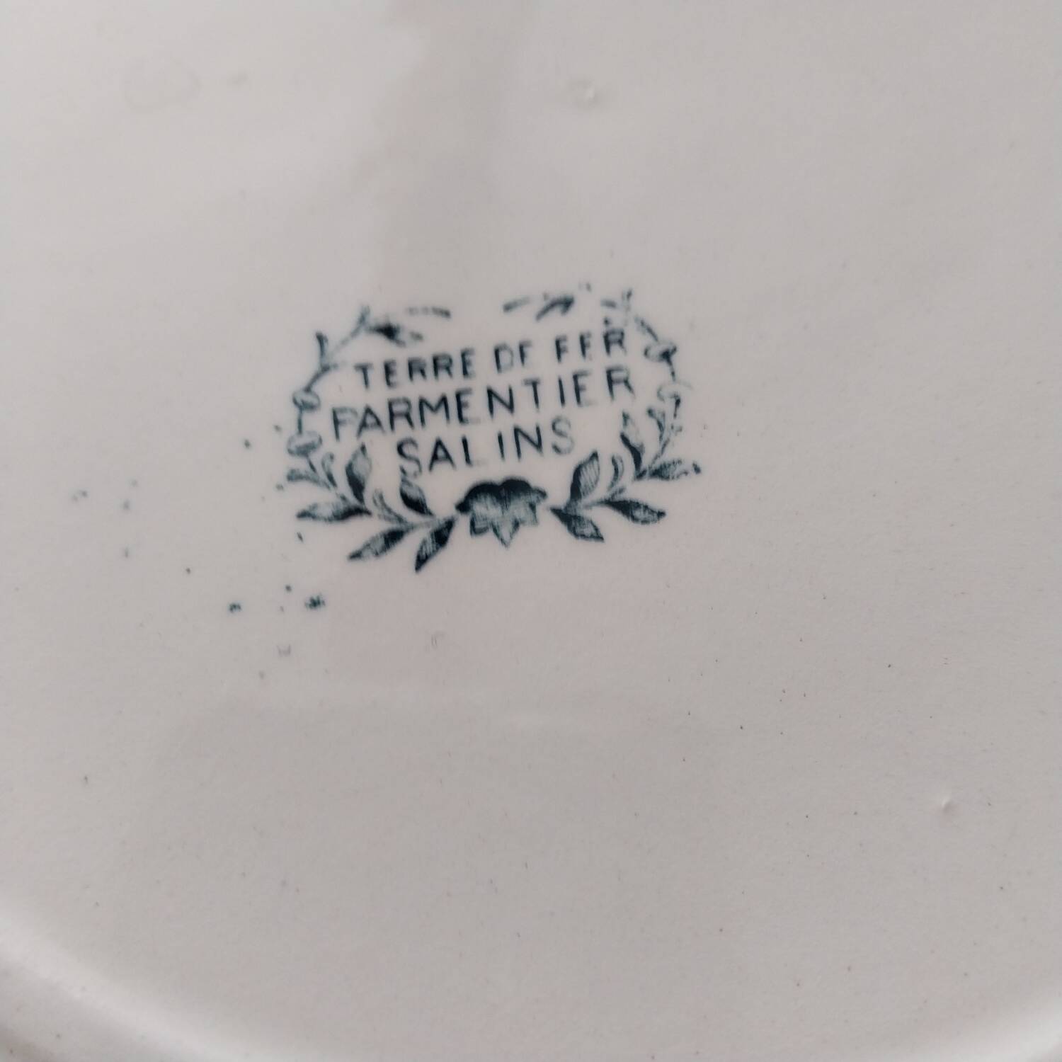 Old large iron earth dish Parmentier Salins