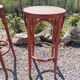 3 wooden bar stools with caning