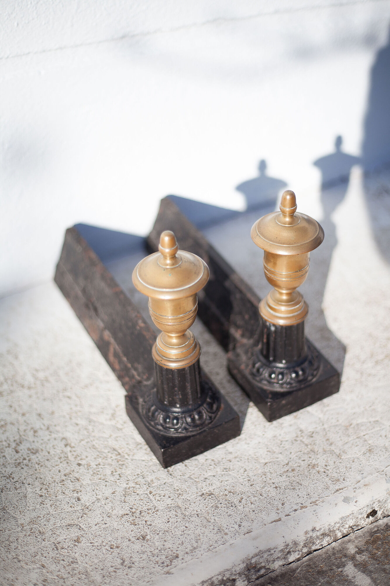 Cast iron and brass chenets