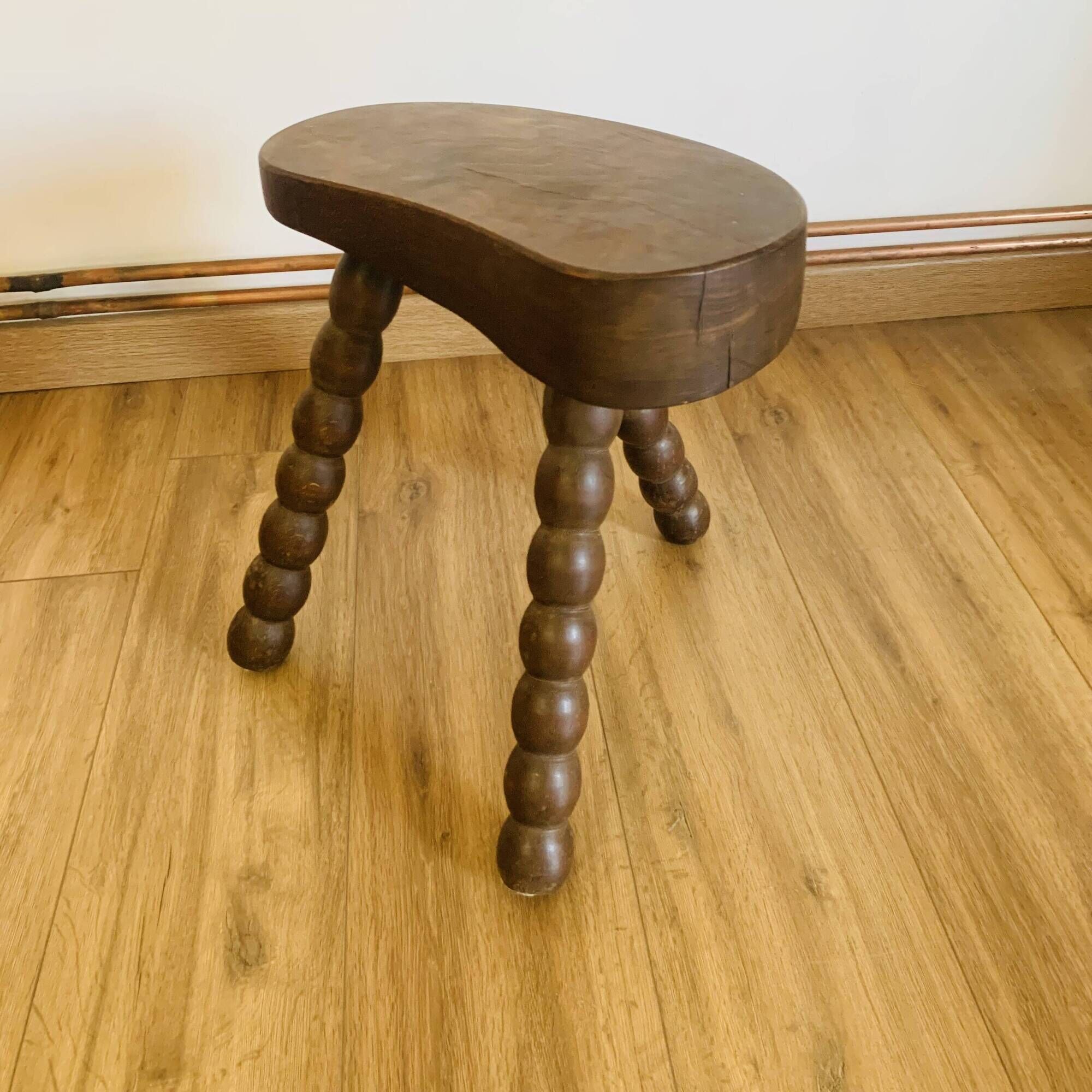 Tabouret vintage à pieds bobines
