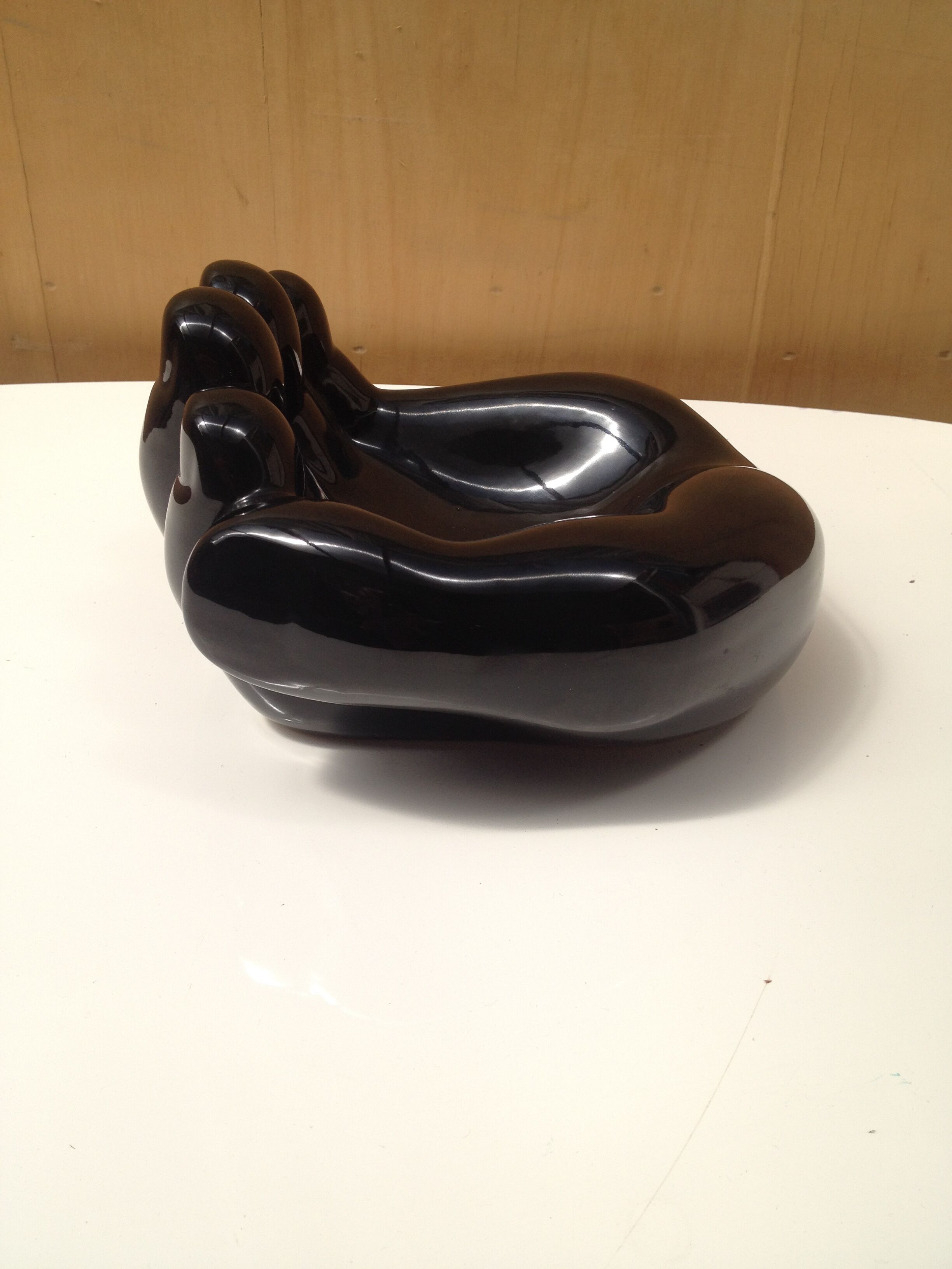 Empty ceramic hand shape pocket