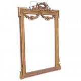 Large mirror in a gold frame, France.