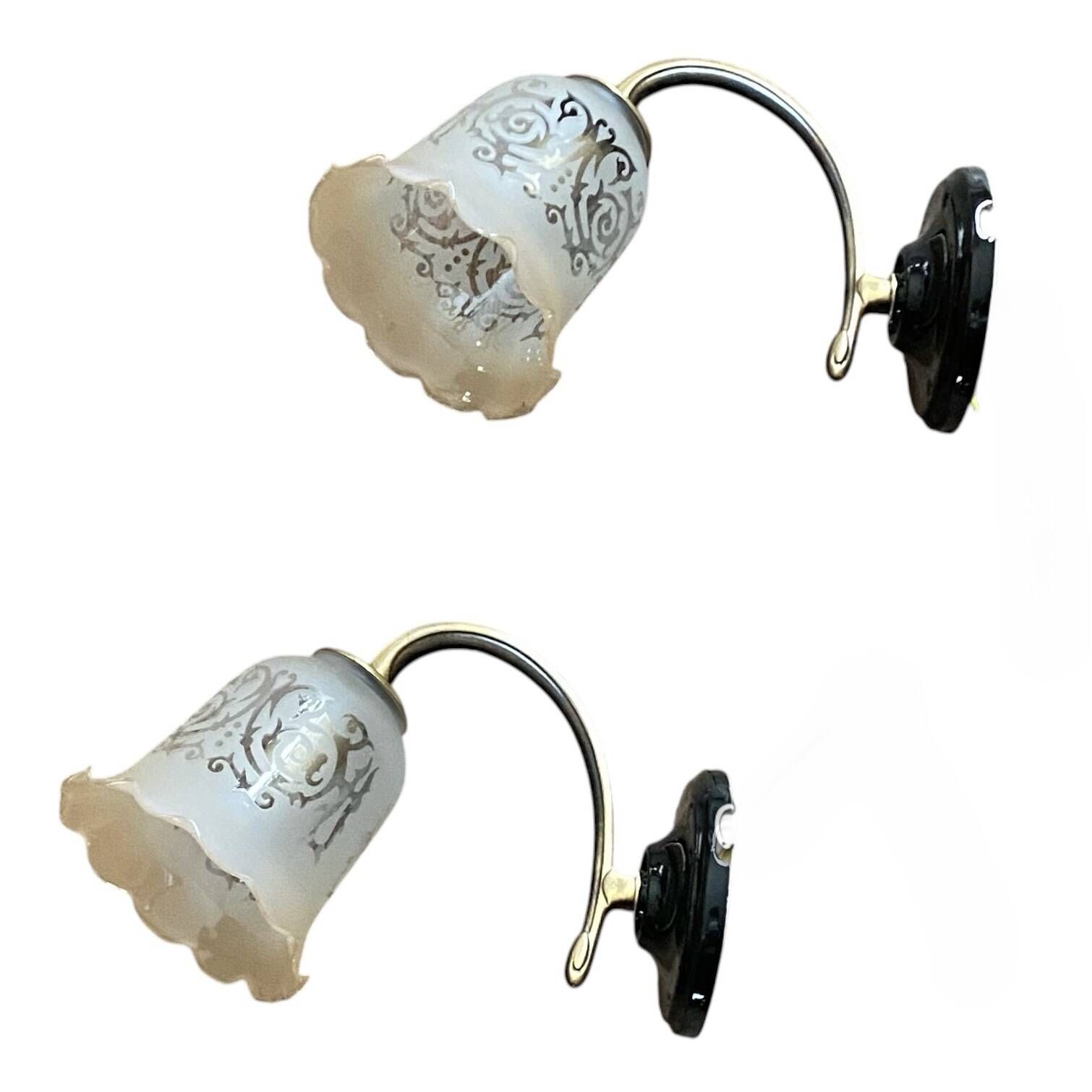 Pair of brass swan neck wall sconces, glass tulips with screen printing.