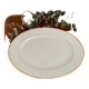 Plat ovale doré et blanc