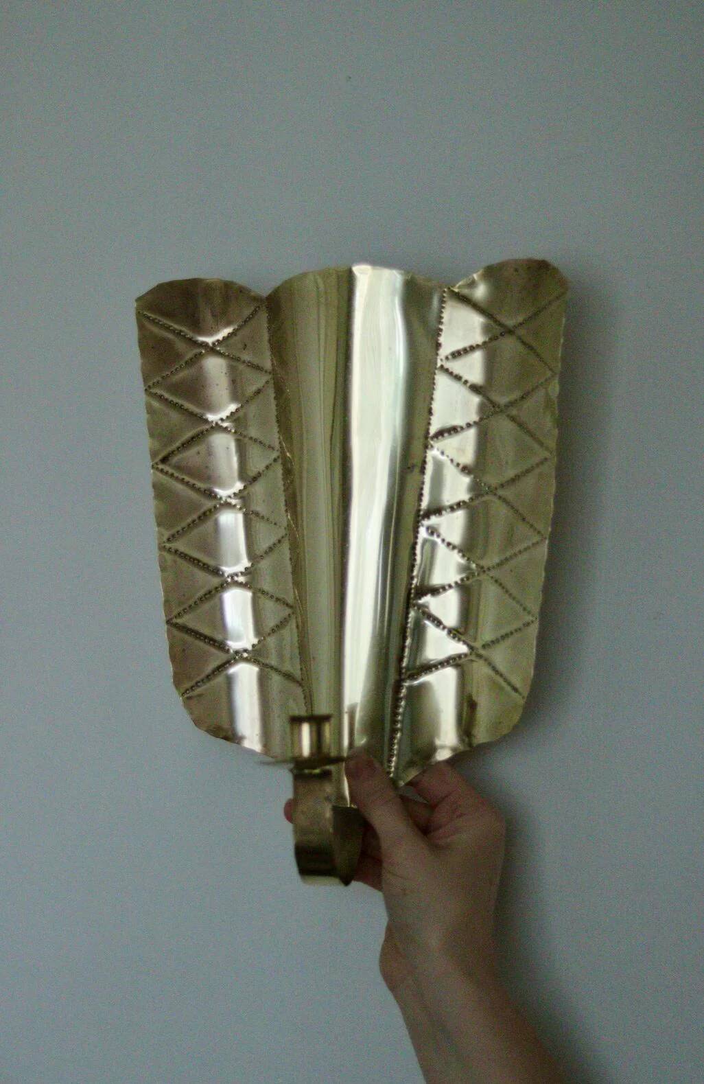 Pair of mid-century Swedish brass shield shape sconces