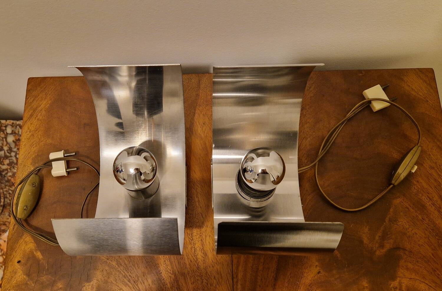 Pair of sculptural lamps in brushed metal – Design by Philippe Rogier