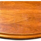 Baumann style wooden table with extensions.
