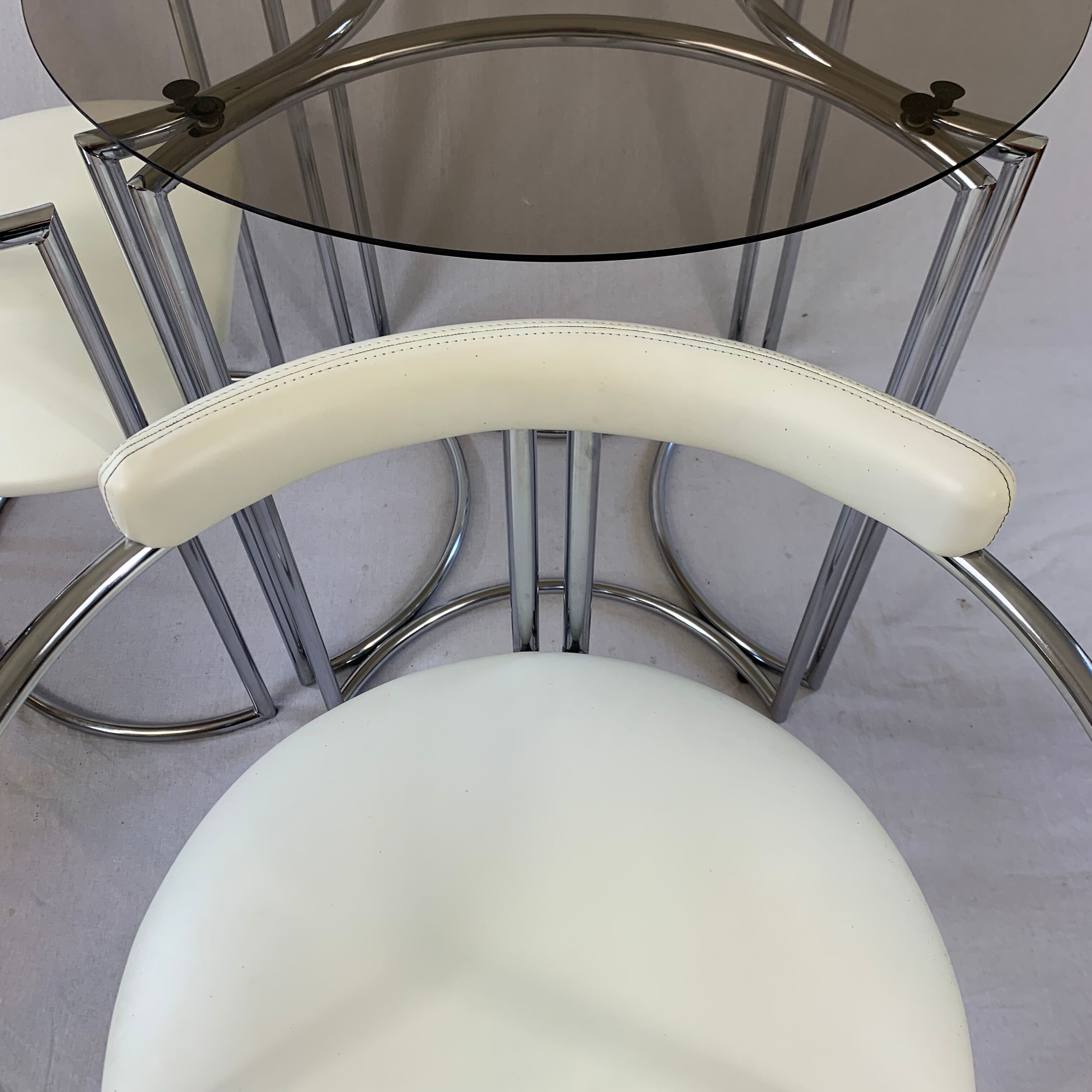 Chrome table and two modernist chairs