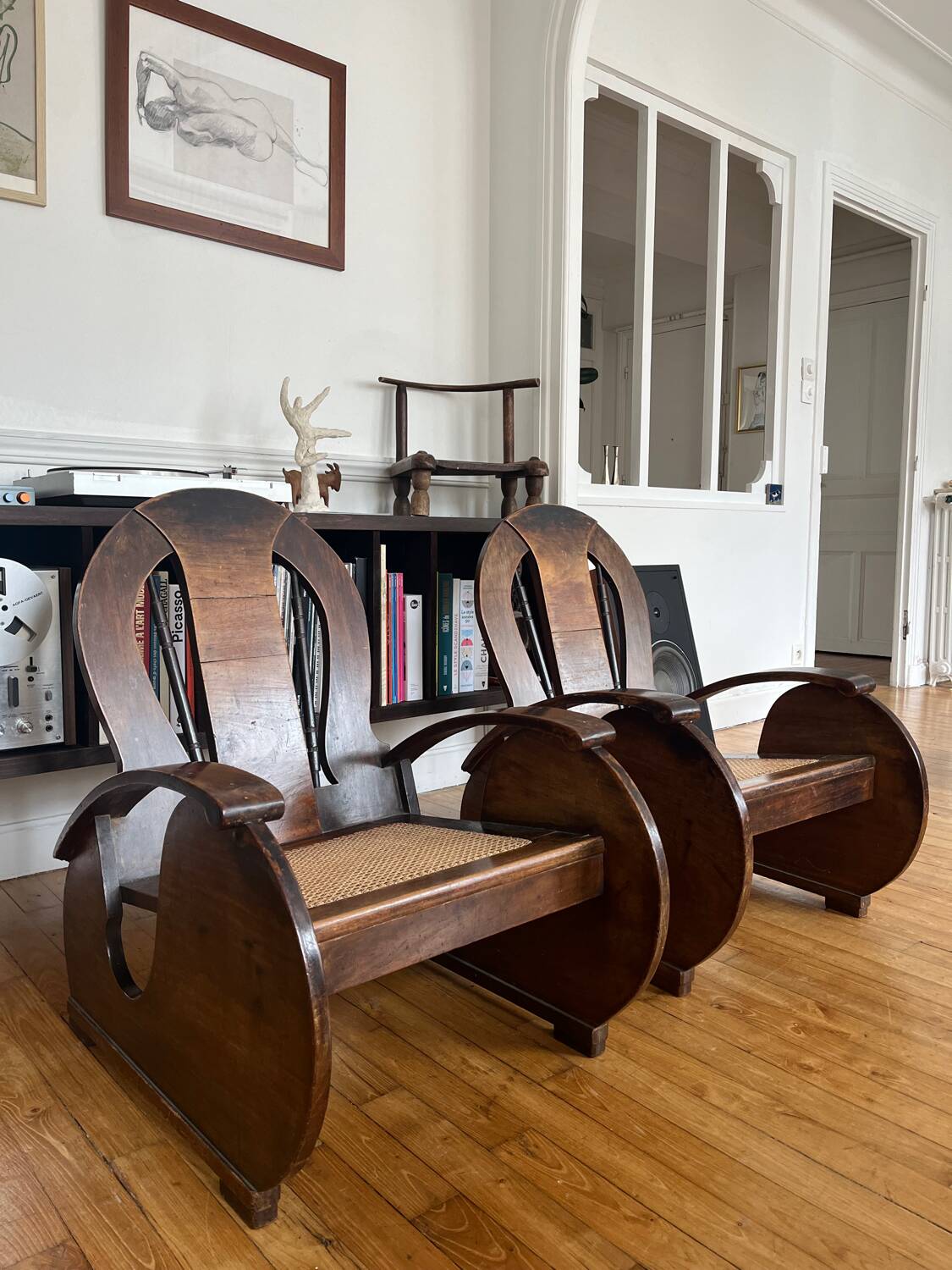 Pair of Art Deco armchairs in wood and cane.