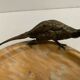 Empty marble pocket has 20th century bronze bird decoration