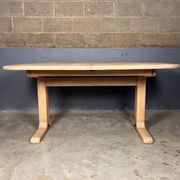 Oval extendable dining table in beech with Danish design.