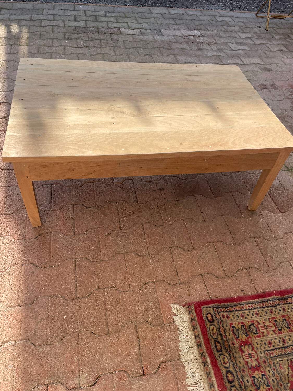 Wooden coffee table with drawer