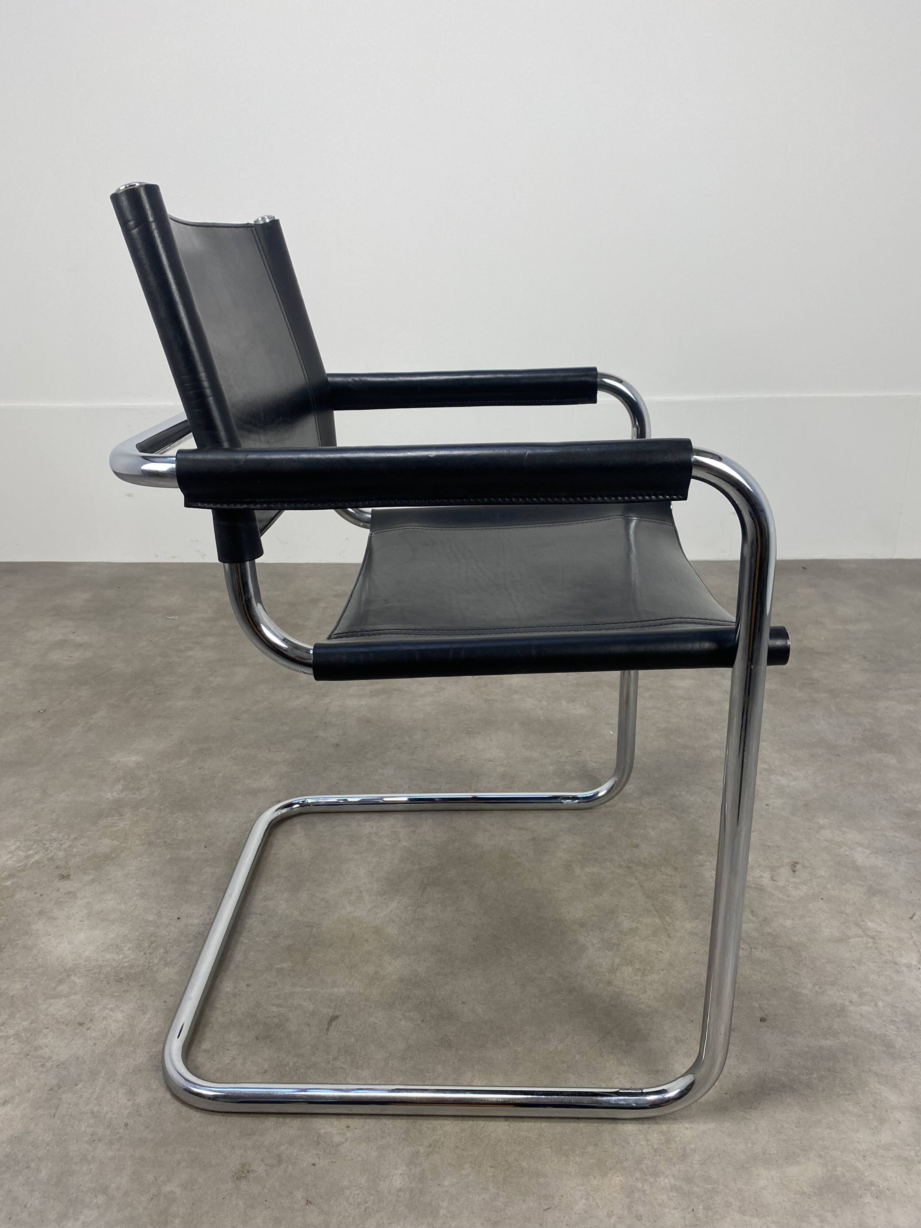 Black and chrome leather cantilever armchair